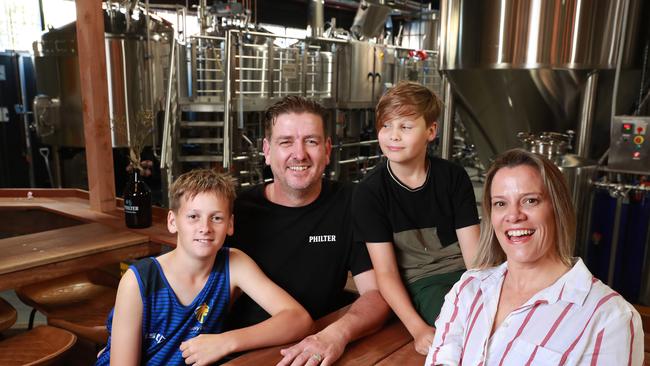 Mick and Claire Neil with sons Zac, 12, and Jared, 10, at Philter Brewing at Marrickville in Sydney’s inner west. Picture: John Feder