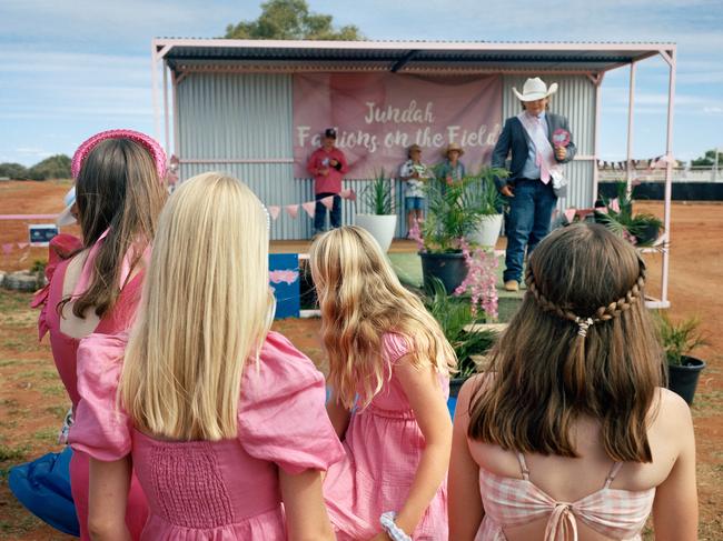 EMBARGO FOR TWAM 11 NOV 2023. FEE MAY APPLY."Fashions on the field, Jundah Picnic Horse Races, Queensland, 2022, #1" by Adam FergusonGalah Press - Finalist for the Regional Photography Prize