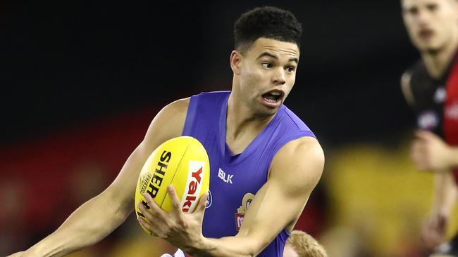 MELBOURNE, AUSTRALIA - AUGUST 21: Jason Johannisen of the Bulldogs is tackled by Adam Cooney of the Bombers during the round 22 AFL match between the Essendon Bombers and the Western Bulldogs at Etihad Stadium on August 21, 2016 in Melbourne, Australia. (Photo by Scott Barbour/Getty Images)