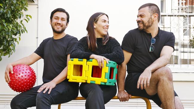 Childcare workers Fernando Villarreal, Jodee Tomsic and Domenico Garzarella like the idea of getting help with buying a home. Picture: Sam Ruttyn