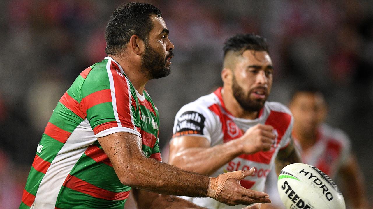 Greg Inglis offloads a pass during the Round 2 NRL match against St George. 
