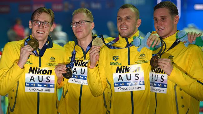 Kyle Chalmers (second from right) celebrates gold in the men’s 4x200m relay with Mack Horton, Clyde Lewis and Alexander Graham at last month’s World Championships in South Korea. Picture: AFP