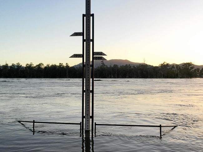 The flood marker in the Rockhampton CBD at 6.30am shows the Fitzroy River has reached 6.4m — 3m short of the predicted peak. Picture: Melanie Plane