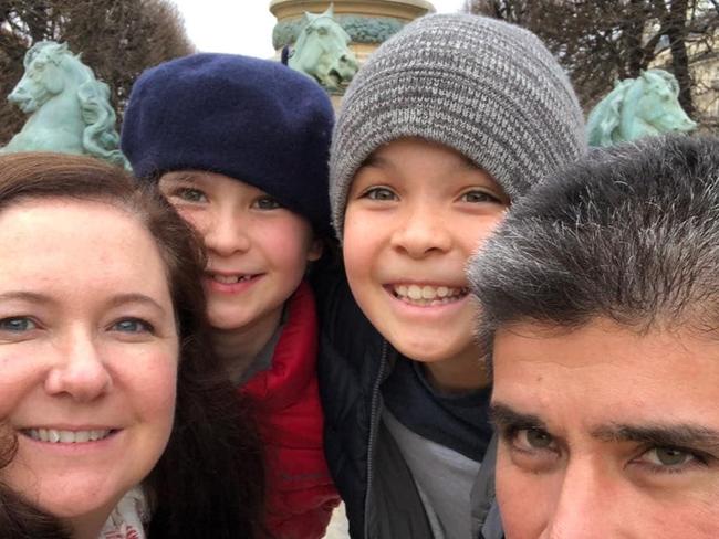 Dulwich Hill Public School mum Yvette McDonald has written an open letter to principals saying their "edicts" about open learning are impossible to follow.She is pictured her with her husband Mario and children Betty, 8 and Xander, 10. Picture: supplied