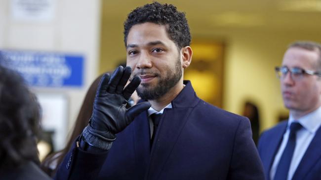 Smollett waves as he follows his lawyer to the microphones after a court appearance in Chicago, Illinois in March 2019 on March 26, 2019 in Chicago, Illinois. This morning in court it was announced that all charges were dropped against the actor. Picture: Nuccio DiNuzzo/Getty Images