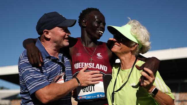 Gout Gout with his manager James Templeton and coach Di Sheppard. Photo by Cameron Spencer/Getty Images