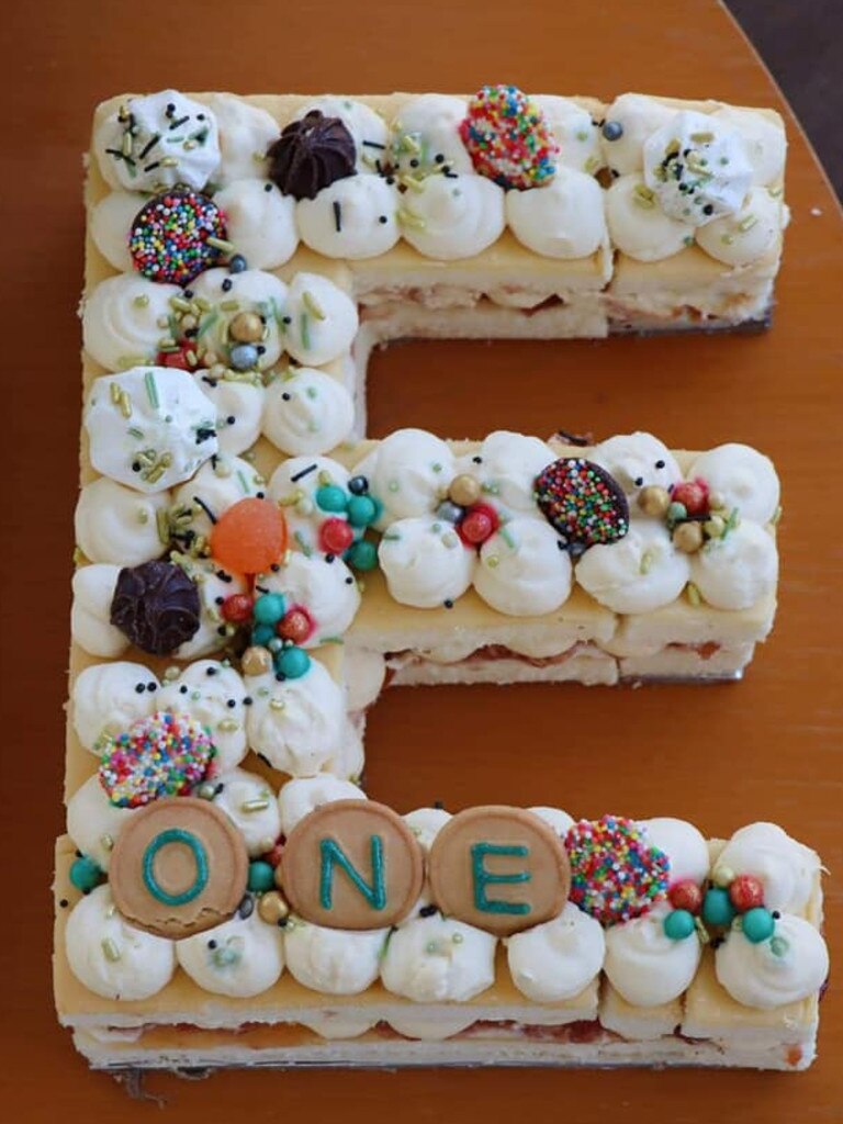 She stacked the three sponge cakes on top of one another before using a stencil to cut the shape. Picture: Supplied