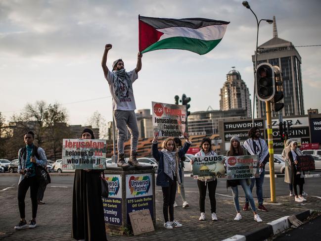 A man waves a Palestinian flag as members of pro-Palestinian groups demonstrate during a protest to mark Nakba Day. Picture: AFP/GULSHAN KHAN
