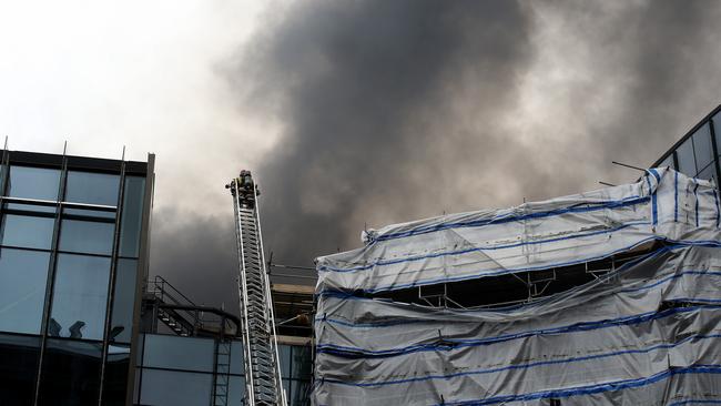 Smoke is seen coming from the SkyCity Convention Centre after a fire broke out on the roof top on October 22, 2019 in Auckland, New Zealand. Photo Phil Walter/Getty Images.