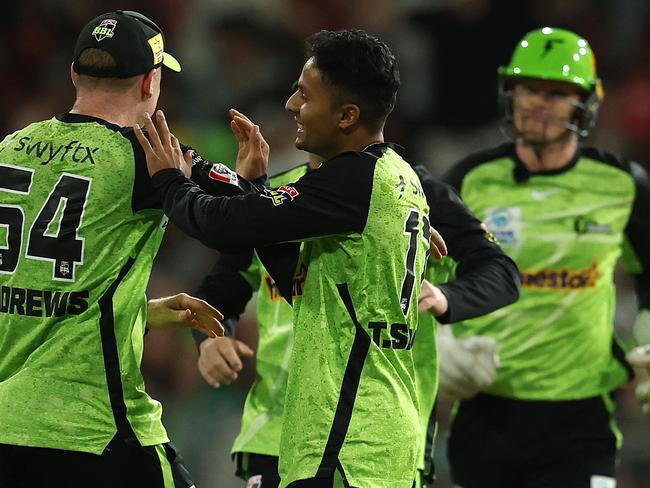 SYDNEY, AUSTRALIA - JANUARY 22: Tanveer Sangha of the Thunder celebrates after taking the wicket of Tom Curran of the Stars during the BBL The Knockout match between Sydney Thunder and Melbourne Stars at ENGIE Stadium on January 22, 2025 in Sydney, Australia. (Photo by Robert Cianflone/Getty Images)