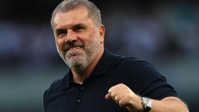 Tottenham Hotspur's Greek-Australian Head Coach Ange Postecoglou celebrates at the end of the English Premier League football match between Tottenham Hotspur and Manchester United at Tottenham Hotspur Stadium in London, on August 19, 2023. (Photo by Adrian DENNIS / AFP) / RESTRICTED TO EDITORIAL USE. No use with unauthorized audio, video, data, fixture lists, club/league logos or 'live' services. Online in-match use limited to 120 images. An additional 40 images may be used in extra time. No video emulation. Social media in-match use limited to 120 images. An additional 40 images may be used in extra time. No use in betting publications, games or single club/league/player publications. /