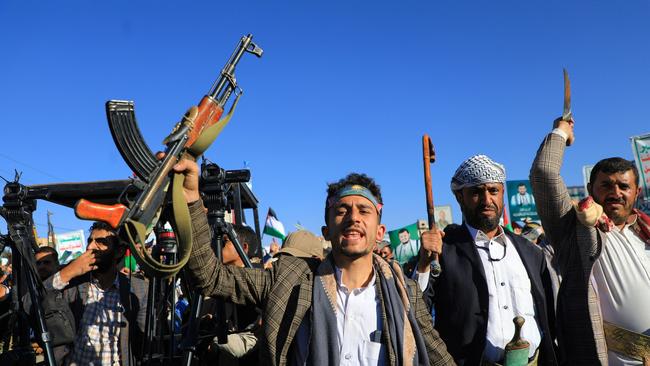 Armed Yemenis march in solidarity with the people of Gaza in the Houthi-controlled capital Sanaa. Picture: AFP