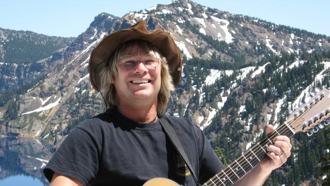 Ted Vigil as John Denver.