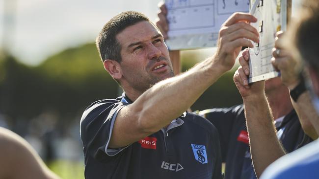 Sturt coach Martin Mattner flips the whiteboard in Sunday’s clash against Port Adelaide at Alberton Oval. Picture: Matt Loxton.