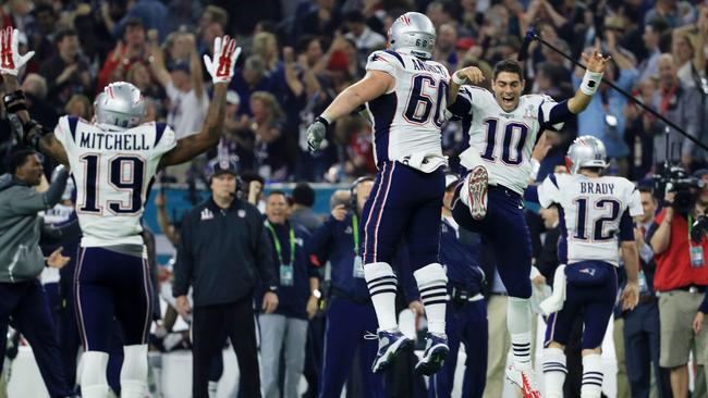 Patriots players celebrate their incredible comeback win. Picture: Getty