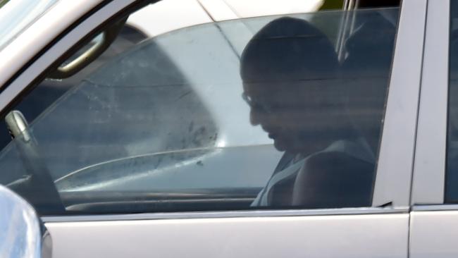 A man appears to be looking down at his phone while stopped in traffic. He could now face a $1000 fine and lose four demerit points. Picture: Evan Morgan