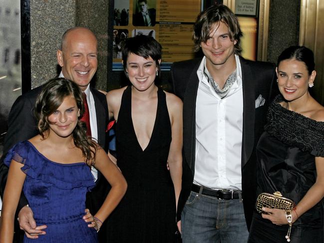 From left, Tallulah Willis, Bruce Willis, Rumer Willis, Ashton Kutcher and Demi Moore in 2007. Picture: AP