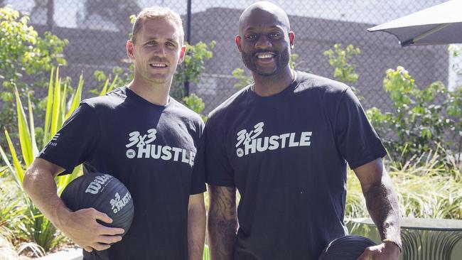 Joel Selwood and Basketballer Corey Williams. Picture: Alan Barber