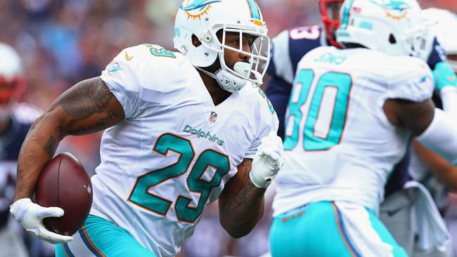 Arian Foster #29 of the Miami Dolphins carries the ball.