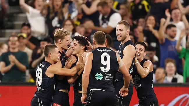 Carlton players celebrate a final quarter goal. Picture: Michael Klein