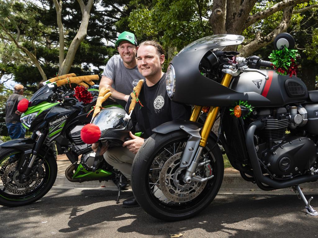Justin Kirkegaard (left) and Rohan Meredith of Darling Downs Riders are ready for the Toowoomba Toy Run hosted by Downs Motorcycle Sporting Club, Sunday, December 18, 2022.