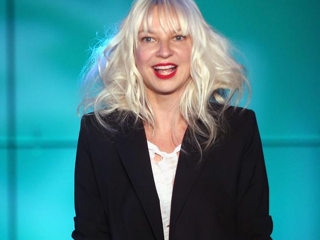 HOLLYWOOD, CA - DECEMBER 08: Singer Sia performs onstage at "TrevorLIVE LA" honoring Jane Lynch and Toyota for the Trevor Project at Hollywood Palladium on December 8, 2013 in Hollywood, California. (Photo by Frederick M. Brown/Getty Images for Trevor Project)