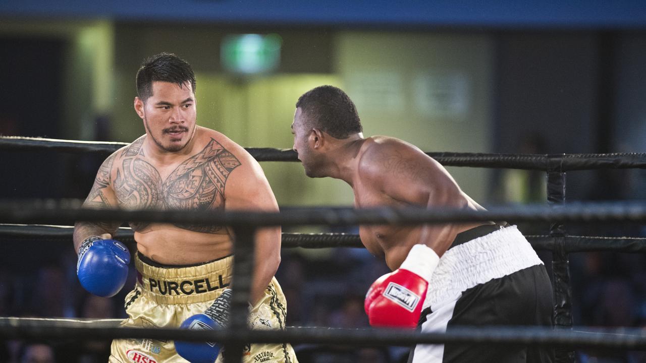 Herman Ene-Purcell and James Singh fight for the WBF World Youth title. S