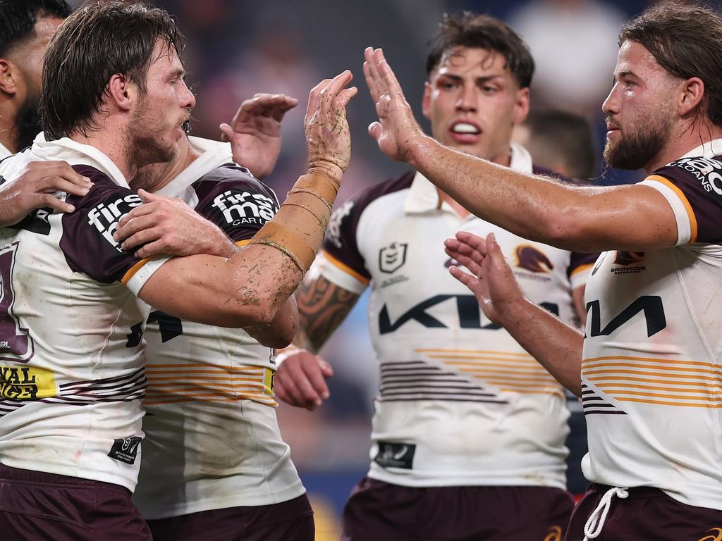 Jack Gosiewski celebrates a try with his Broncos teammates. Picture: Getty Images