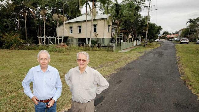 PLAYING IT SAFE: Michael Wood and Bill Moorhouse from the Richmond River County Council in a flood-affected area in North Lismore. Picture: Doug Eaton