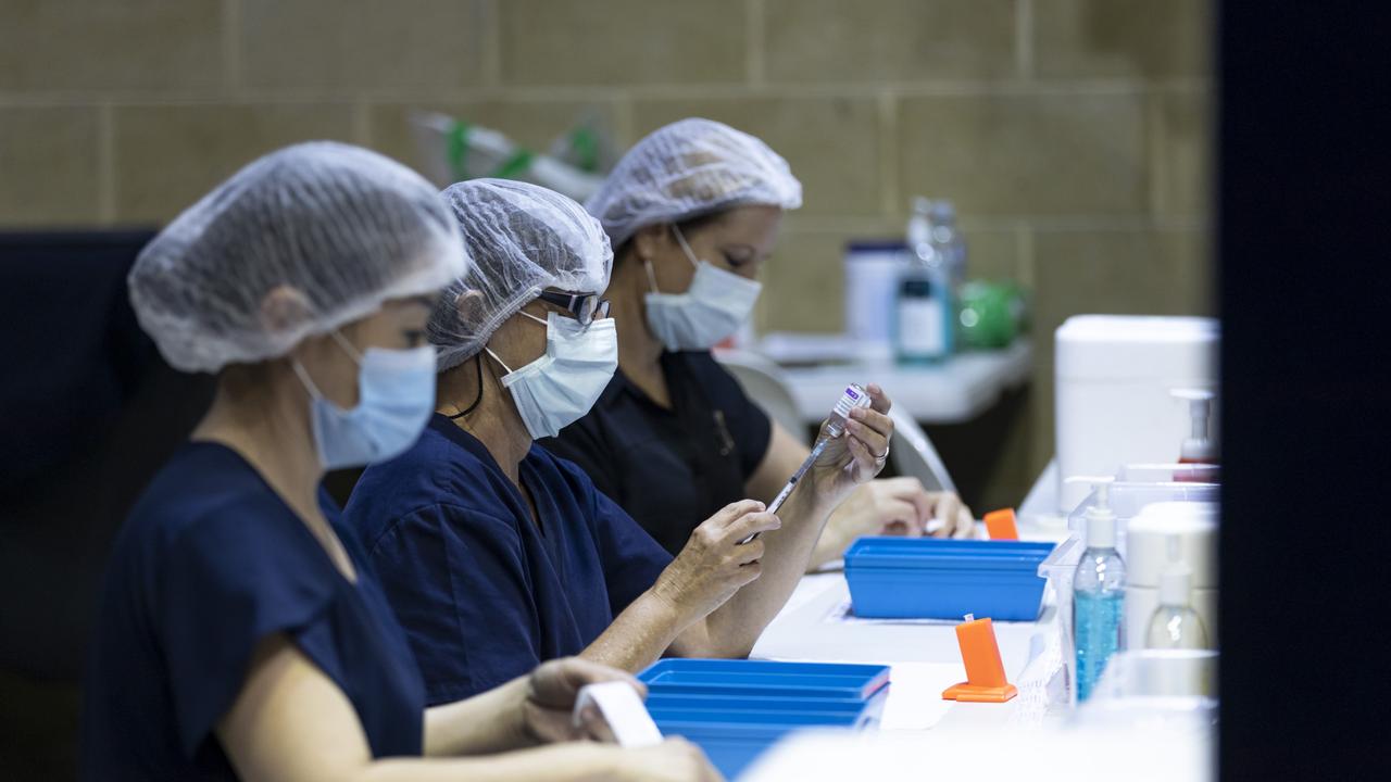 Nurses are seen drawing up doses from a multi-dose vile of AstraZeneca Covid-19 vaccine at Claremont Showground on April 28, 2021 in Perth, Australia. Picture: Getty Images.