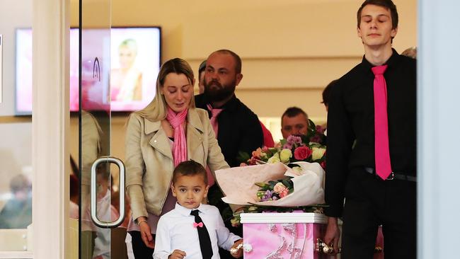 Ellie’s son, Mostafa, 4, accompanies his mum’s coffin with her sister, Danielle Price and brother Dylan Taylor. Picture: Zak Simmonds