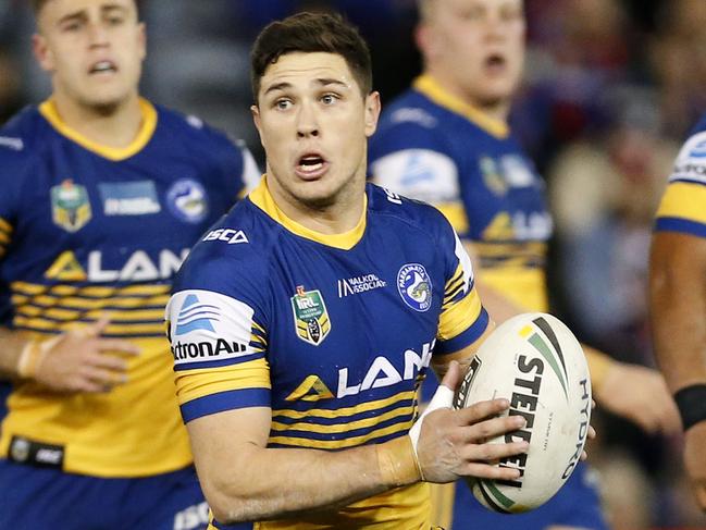 Mitchell Moses of the Eels runs with the ball during the Round 18 NRL match between the Newcastle Knights and the Parramatta Eels at McDonald Jones Stadium in Newcastle, Friday, July 13, 2018. (AAP Image/Darren Pateman) NO ARCHIVING, EDITORIAL USE ONLY