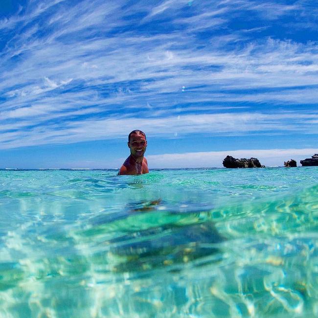 Lincoln Lewis promotes ocean preservation while skinny dipping... 