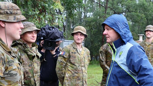 BRISBANE, AUSTRALIA - MARCH 9:  Prime Minister Anthony Albanese, Deputy Prime Minister and Minister for Defence, Richard Marles, Treasurer Jim Chalmers and the Minister for Emergency Management, Jenny McAllister during a visit to the Gallipoli Barracks on March 9, 2025 in Brisbane, Australia. Australia's east coast is experiencing severe weather as ex-Tropical Cyclone Alfred moves south. While downgraded from cyclone status, the weather system continues to bring damaging winds, heavy rainfall, and flash flooding, particularly in the Gold Coast and northern NSW regions. Authorities have issued severe weather warnings, and coastal areas remain at risk of significant erosion and hazardous surf conditions. Residents are urged to stay updated on local warnings, avoid floodwaters, and prepare for ongoing disruptions. (Photo by Tertius Pickard - Pool/Getty Images)