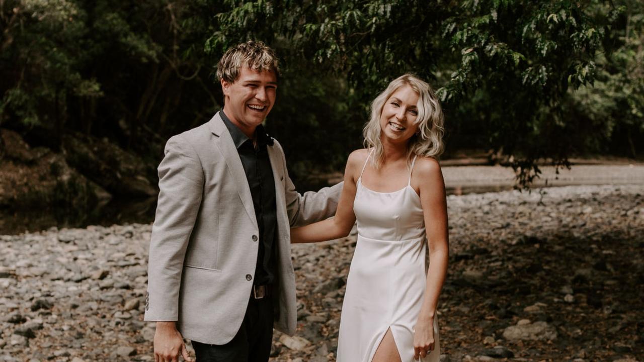 Ruby and Chris Rose are one of a growing number of couples who are choosing to elope. They got married in the Promised Lands outside Bellingen on the Mid North Coast with just a celebrant, photographer and witness present. Ruby says the low-key wedding suited them and they preferred to save money they would have spent on a wedding for a holiday. Photo: Nicola Bodle / Fox & Kin