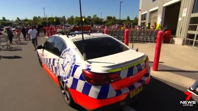 Police presence outside Costco in Casula on Wednesday. Picture: 7News