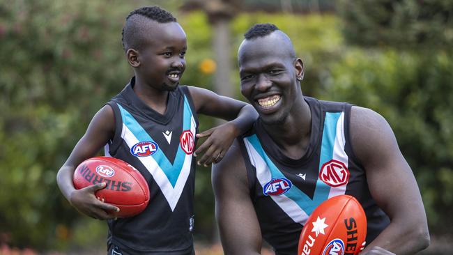 Aliir Aliir and Timothy Kuol enjoy a laugh. Picture: Aaron Francis