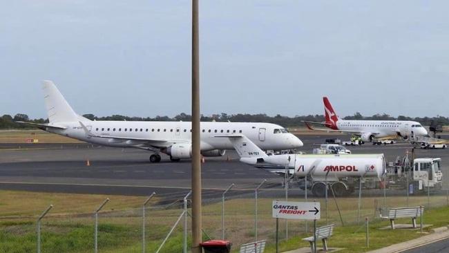 QF1871 from Townsville to Brisbane (the plane in white) diverted to Rockhampton following a ‘pressurisation’ issue. Picture: John Lee / Central Queensland Plane Spotting Blog