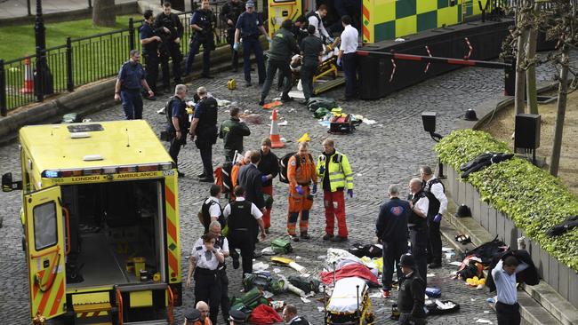 Emergency services at the scene outside the Palace of Westminster, London.