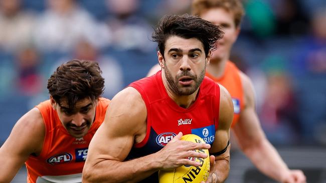 MELBOURNE, AUSTRALIA - MARCH 16: Christian Petracca of the Demons runs with the ball during the 2025 AFL Round 01 match between the Melbourne Demons and the GWS Giants at the Melbourne Cricket Ground on March 16, 2025 in Melbourne, Australia. (Photo by Dylan Burns/AFL Photos via Getty Images)