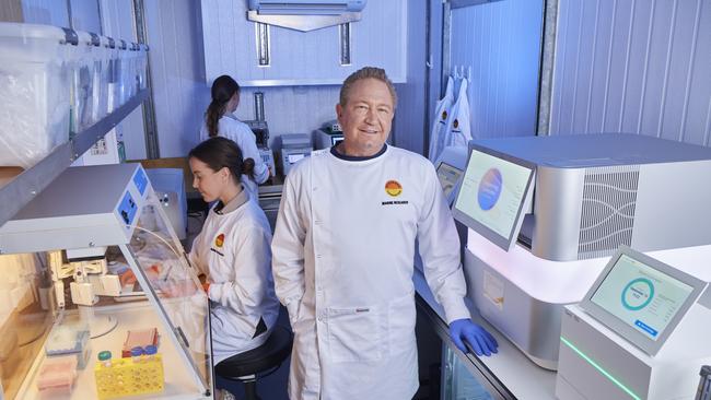 Minderoo Foundation chairman Andrew Forrest with molecular scientists Priscila Goncalves and Madalyn Cooper in one of the three laboratories on board the Pangaea Ocean Explorer. Picture: Frances Andrijich