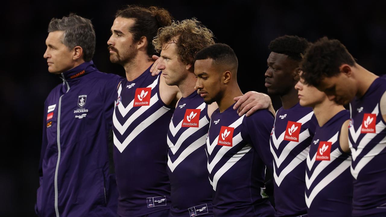 PERTH, AUSTRALIA - SEPTEMBER 03: David Mundy of the Dockers looks on with Alex Pearce and Brandon Walker for the Welcome to Country during the AFL First Elimination Final match between the Fremantle Dockers and the Western Bulldogs at Optus Stadium on September 03, 2022 in Perth, Australia. (Photo by Paul Kane/Getty Images)