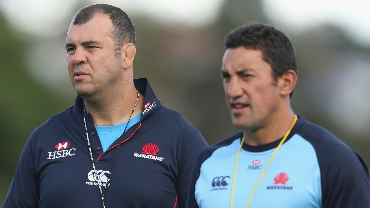 HOBART, AUSTRALIA - FEBRUARY 02: Waratahs head coach Michael Cheika (L) and assistant coach Daryl Gibson look on during the Super Rugby trial match between the Waratahs and the Rebels at North Hobart Stadium on February 2, 2013 in Hobart, Australia. (Photo by Scott Barbour/Getty Images)