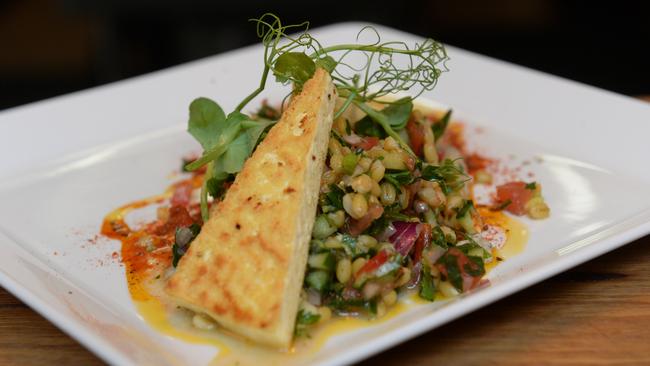 Lentil As Anything's pay as you feel, high quality vegan and vegetarian meals are attracting a huge range of diners. Marinated Tofu on Freekah Tabouleh. Picture: Kylie Else