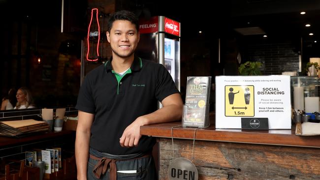 Thai La-Ong co-owner Eagle Patanan was happy to see customers in his Church St restaurant. Picture: Jonathan Ng