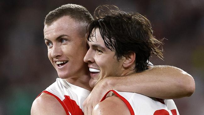 Sydney's Chad Warner and Errol Gulden celebrate setting up a goal to Logan McDonald during the Round 1 AFL match between the Collingwood Magpies and the Sydney Swans at the MCG on March 15, 2024. Photo by Phil Hillyard(Image Supplied for Editorial Use only - Phil Hillyard  **NO ON SALES** - Â©Phil Hillyard )