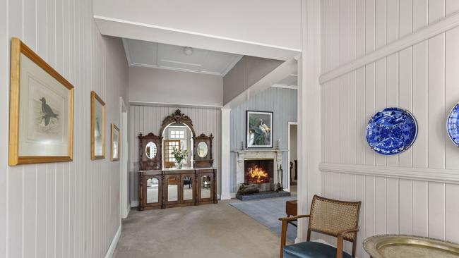 Front Entrance with Sideboard and marble fireplace Photo: Supplied