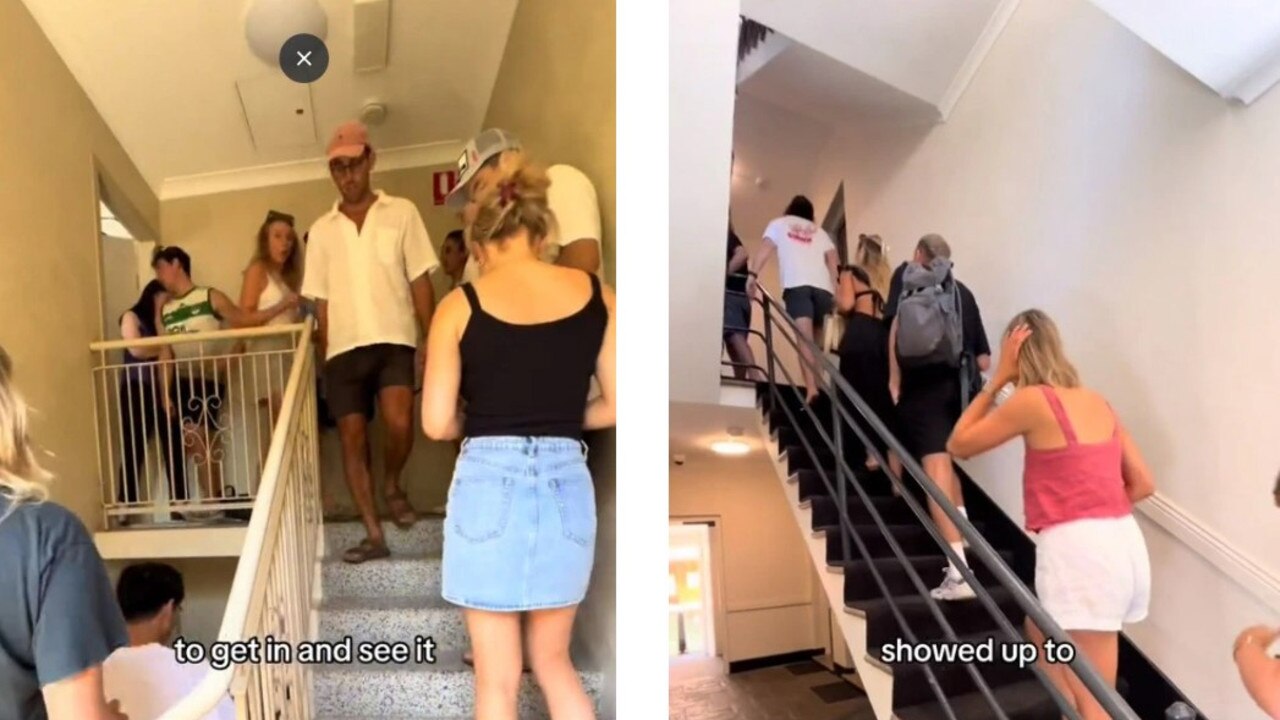 Hordes of hopeful renters queue to inspect a vacant property in Sydney.