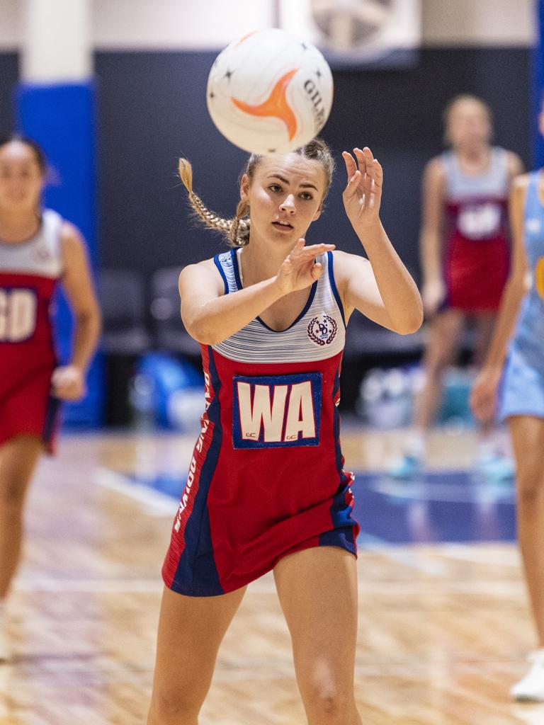 Krista Hughes for Darling Downs against Peninsula in Queensland School Sport 16-19 Years Girls Netball Championships at Clive Berghofer Arena, St Mary's College, Friday, May 6, 2022. Picture: Kevin Farmer