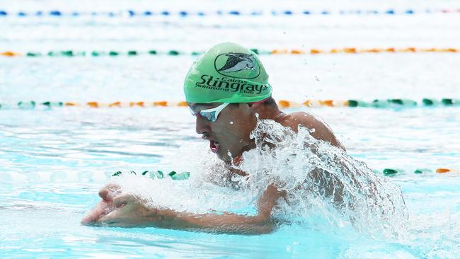 Stingrays swimming club's Ryan Woodward swims the breaststroke leg of the 14 years and over boy's 50 metre medley race at the FNQ Swimming Short Course Championships, held at the TAS Aquatic Centre. PICTURE: BRENDAN RADKE